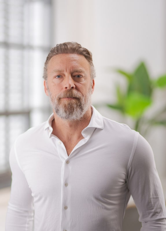 Dr. Travis Corcoran